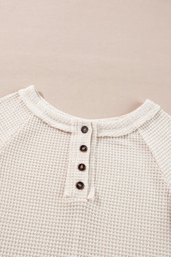 Large blouse with Raglan buttoned sleeves on the front in woven knitting oatmeal