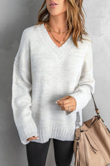 Pull tricoté blanc à col en V et épaules tombantes
