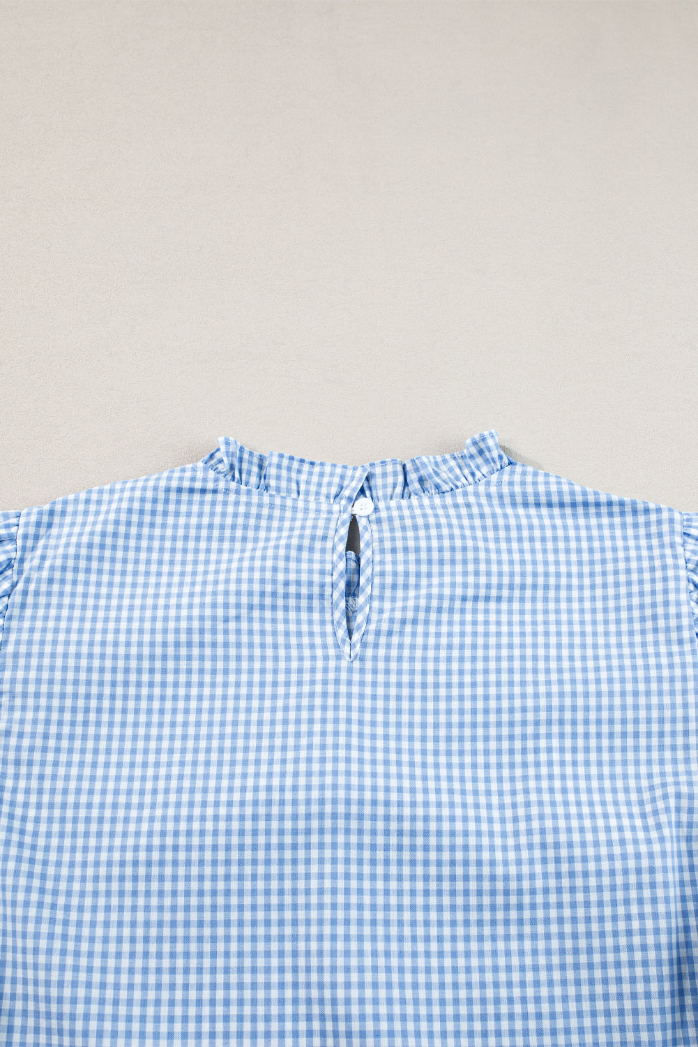 Blusa de manga bordada de gingham de azul claro