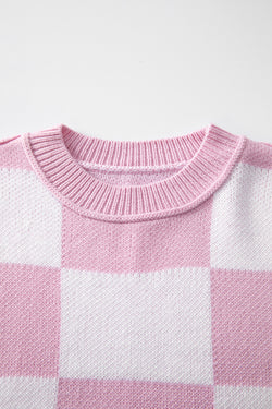 Pull rose à carreaux et manches évêque