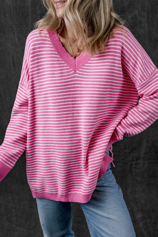 Loose V-neck sweater with pink striped slits