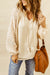 Blusa beige con cuello dividido y mangas hinchadas en malla de leopardo