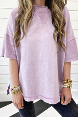 Surprised t-shirt with drooping shoulders and visible seams with mineral washed out and orchid petals