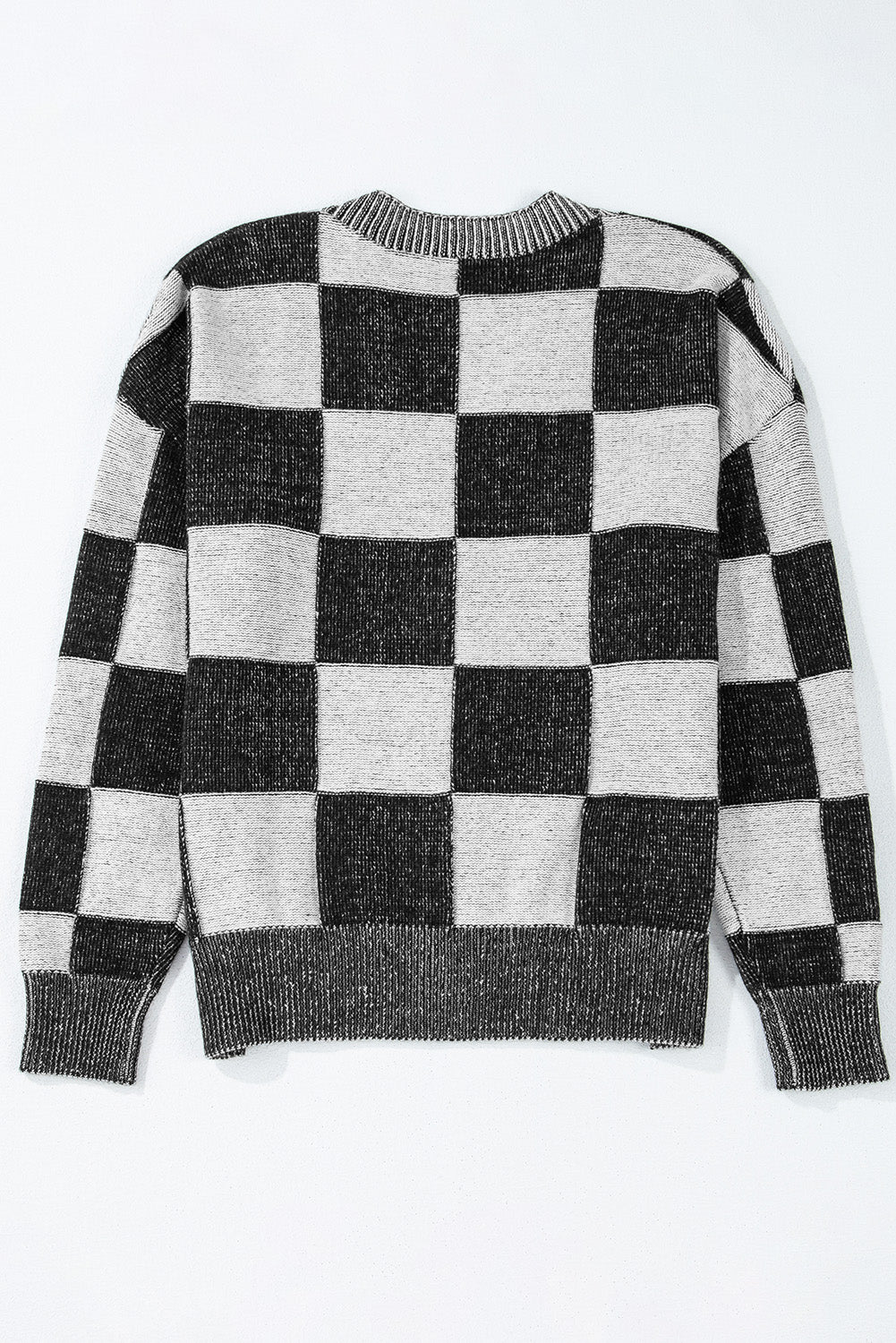Cardigan noir à carreaux et épaules tombantes boutonné à col en V-A WOMAN WE LOVE