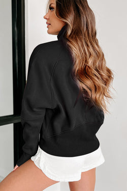 Black sweatshirt with stand-up collar and kangaroo pocket with quarter-turn zip