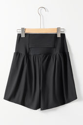 Black bath shorts with pockets and wide belt