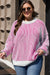 Pull ample à bords contrastés en tricot texturé à rayures rose vif