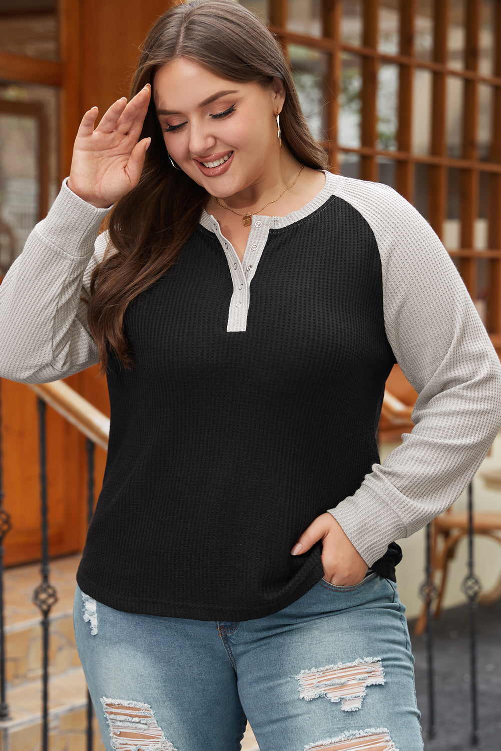 Large large size button in black contrasting knitting
