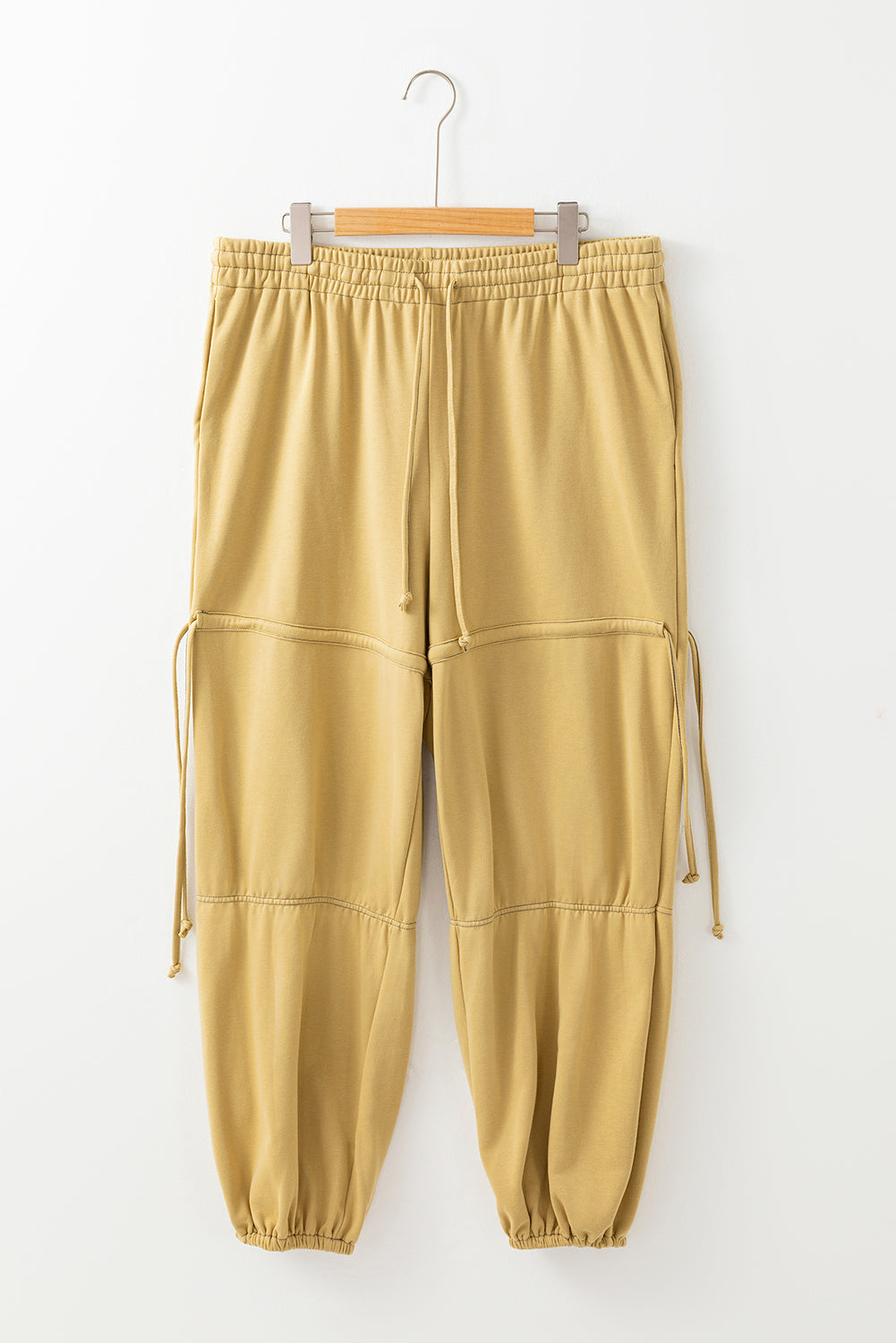 Beige high waisted drawstring fitted band pants