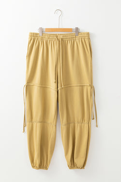 Pantalones de cintura alta con tira ajustada con cordón de apriete beige