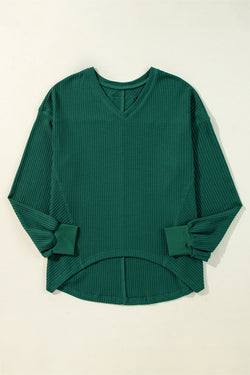 Ample blouse with long sleeves and blackish robe green v for drooping shoulders