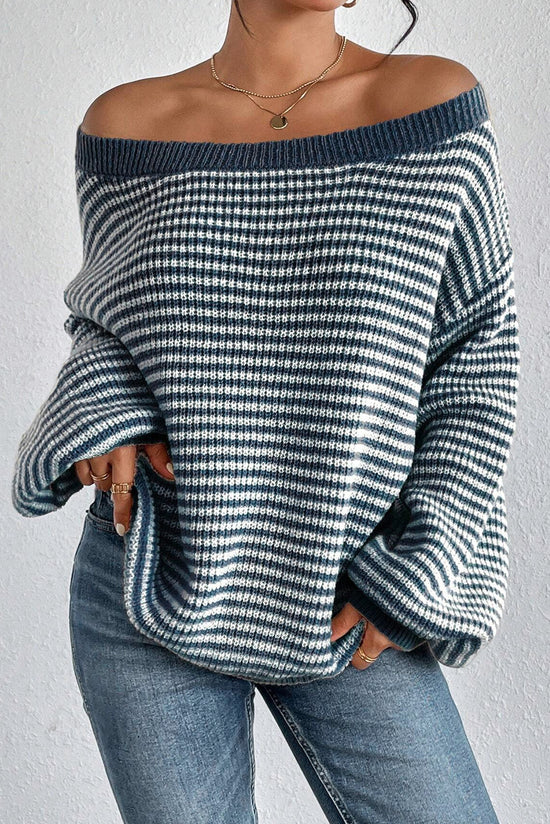 Cozy sweater with lanterns sleeves and drooping shoulders with blue veil stripes