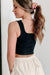 Sleeveless square neck crop top with black pearl decoration