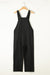 Black short overalls with buttoned straps and drawstring