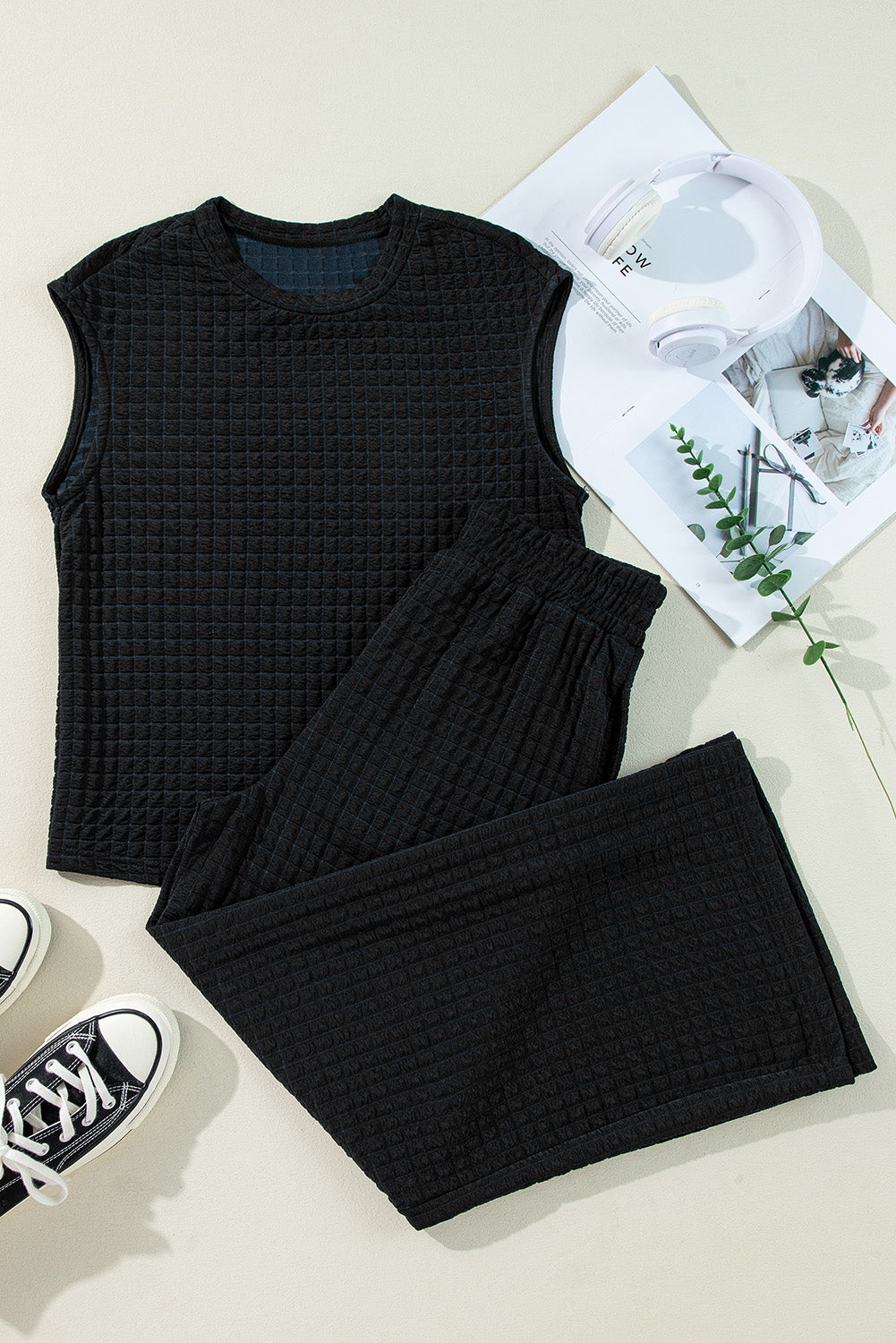 Ensemble t-shirt à manches courtes et pantalon large en tricot texturé de couleur noir-A WOMAN WE LOVE