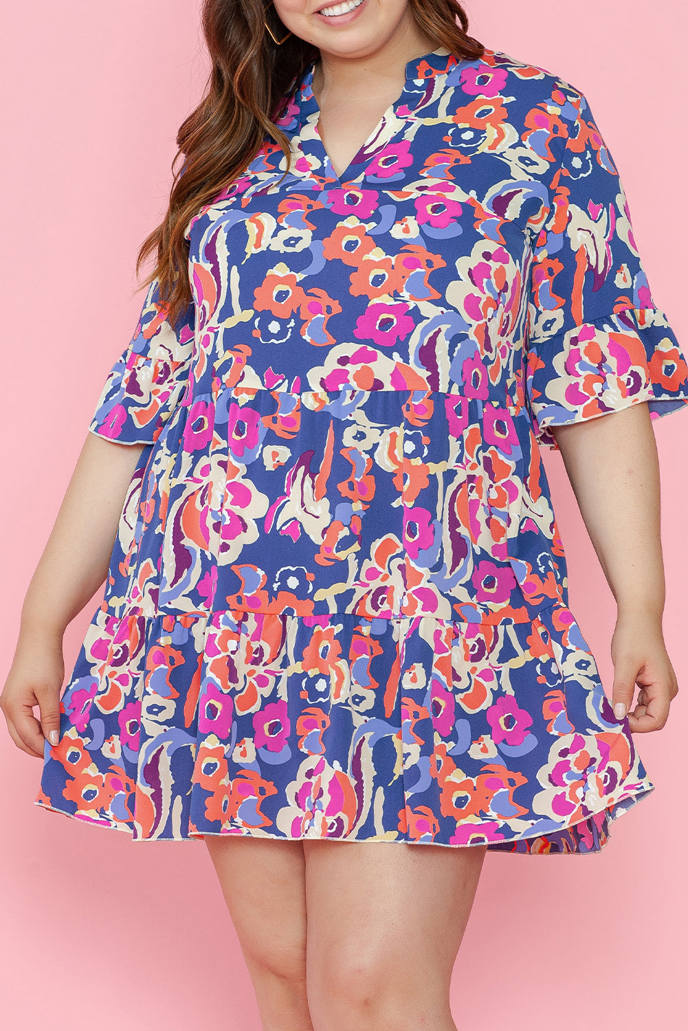 Blue mini-ruffle with ruffle and 3/4 sleeves with large floral print