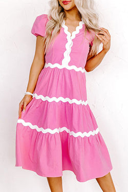 Mid-length fluid dress with short puffing sleeves and candy ric rac border