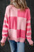 Large pink sweater for a low -low striped color block