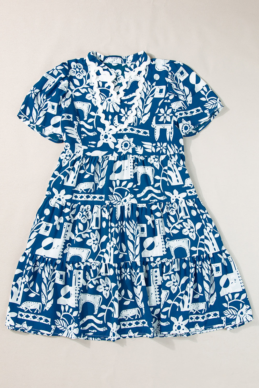 Robe ample florale bleue à col fendu et bordure Ricrac