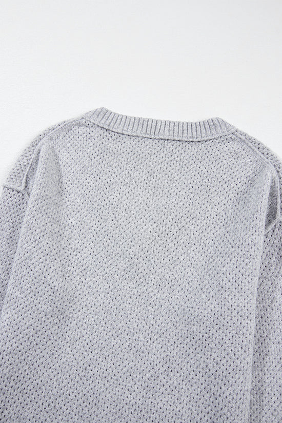 Light -gray Light gray sweater and drooping shoulders with eyelets