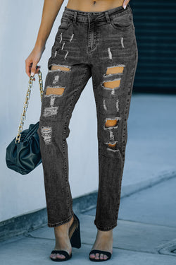 Gray aged effect jeans with buttoned pockets