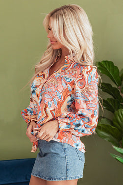 Large shirt buttoned with frowned and orange floral print