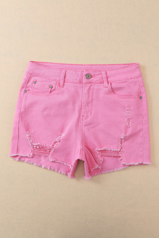 Solid color pink distressed denim shorts