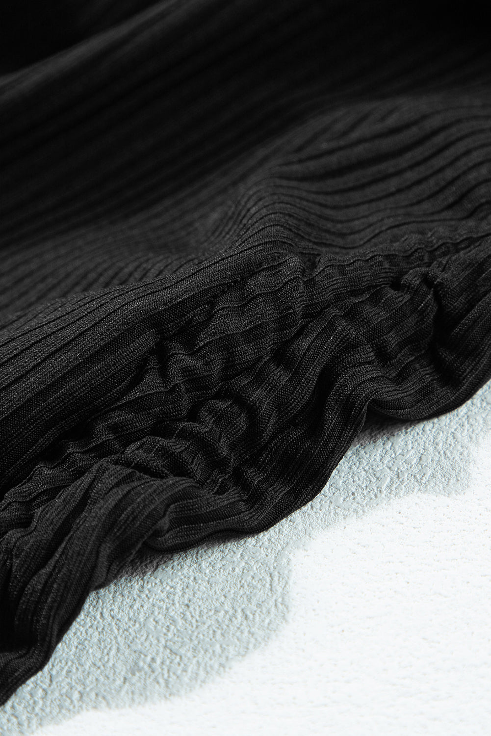 Bathroom A ribbed black room *