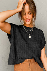 Pull noir à manches courtes et col rond en tricot torsadé