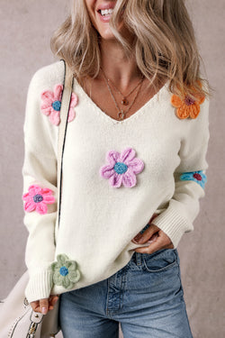 Pull blanc à col en V et fleurs au crochet