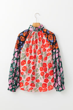 Red shirt with puffy sleeves and floral print color block