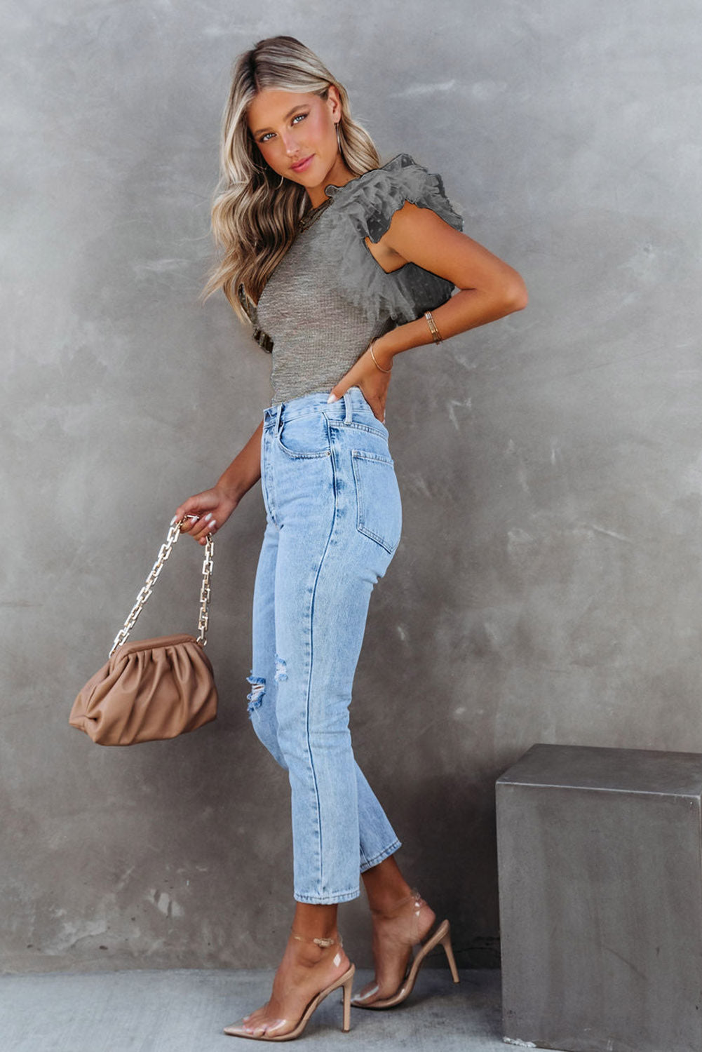Gray ribbed knitting high with fluffy sleeves in polka dot mesh