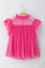 Flared babydoll blouse with rolled sleeves in pink strawberry tulle