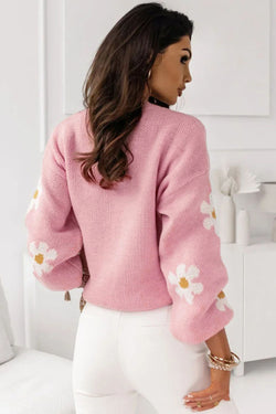 Sweater rosa de hombro rosa y motivo floral