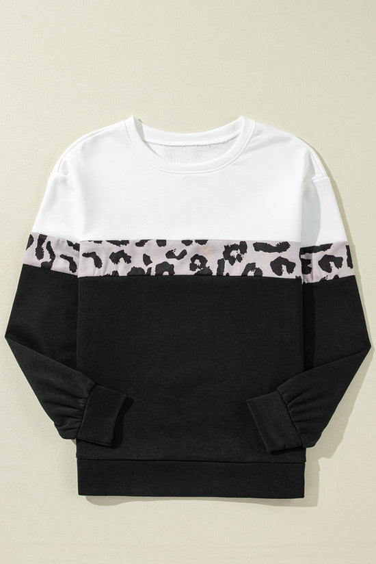 Black leopard top with long sleeves and a color block crew neck