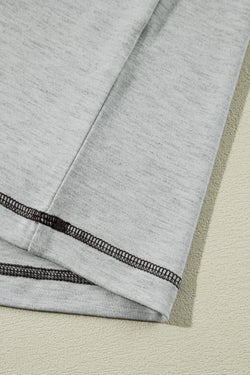 Grey set with cuffed sleeves and contrasting stitching shorts