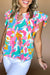 Blouse multicolore à imprimé abstrait et col cranté à manches flottantes