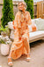 Robe longue smockée à imprimé floral orange*