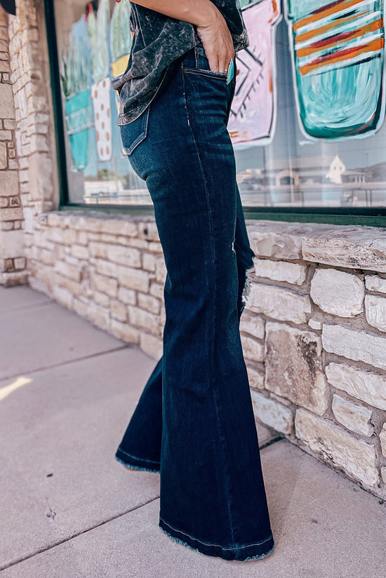 High -waisted jeans torn high and blue sarcelle blue bell real