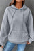 Grey quilted hoodie with kangaroo pocket and drawstring