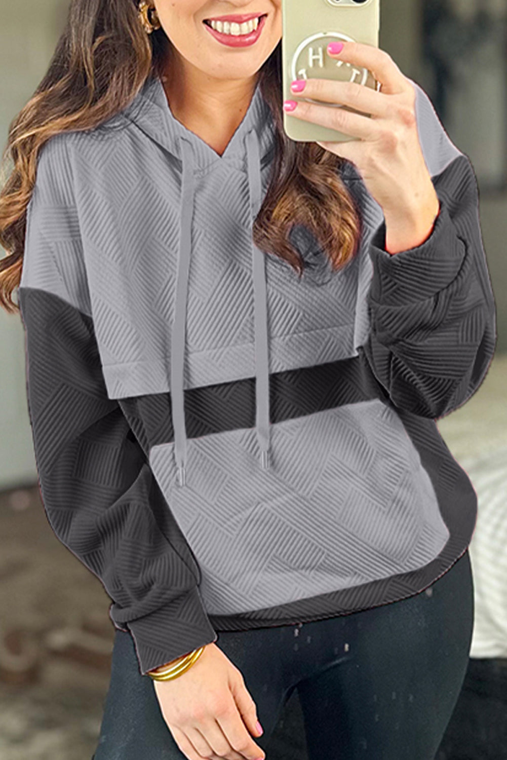 Grey textured hoodie with kangaroo pocket and dropped shoulders