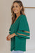 Green loose blouse with flared sleeve and v -collar