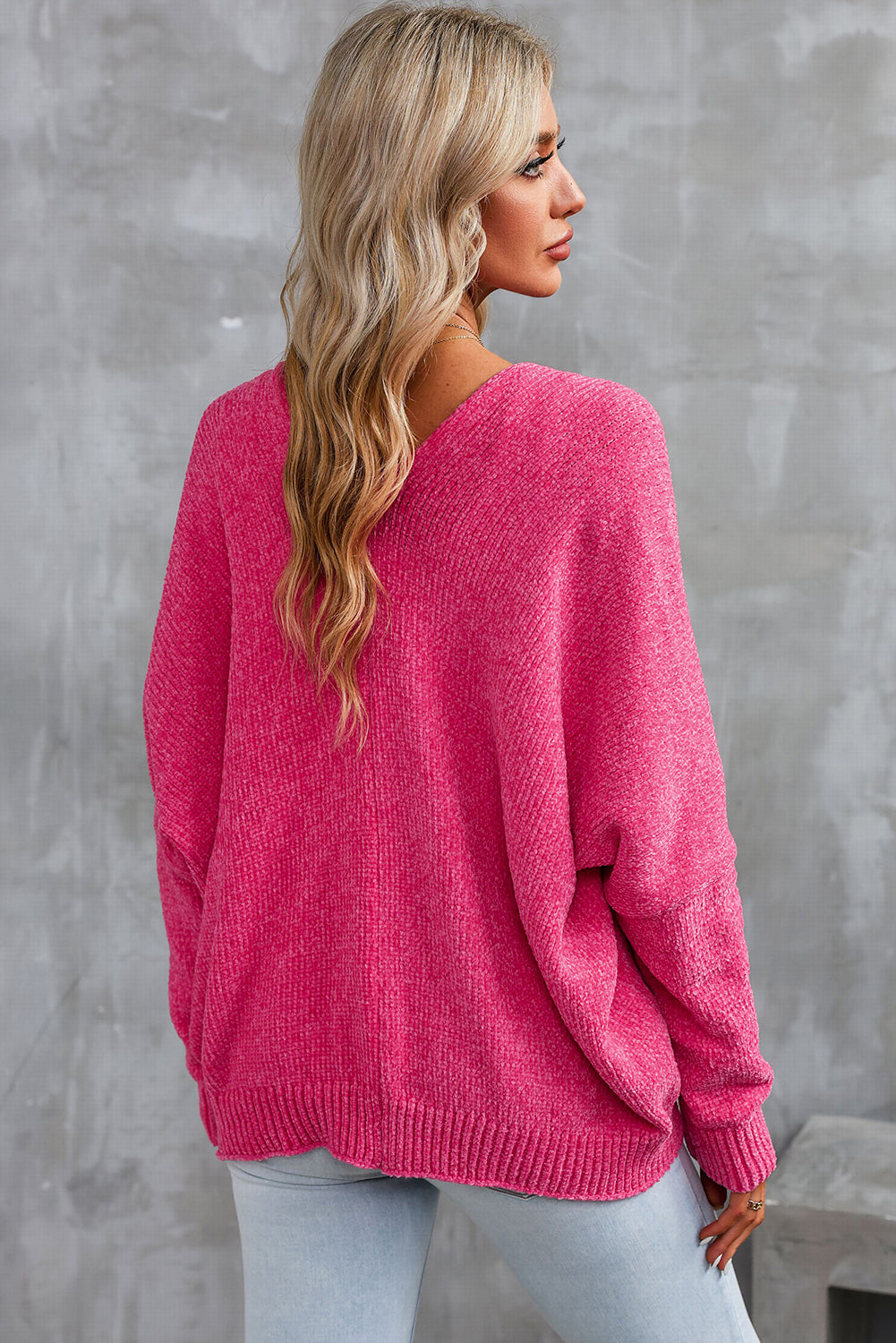 Cardigan pull avec poches sur le devant et boutons roses-A WOMAN WE LOVE