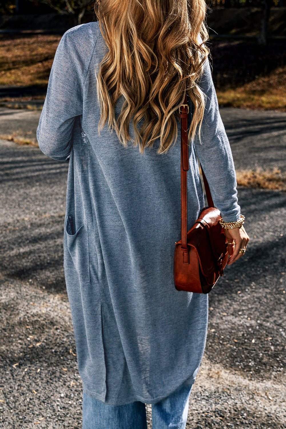 Cardigan long ouvert sur le devant avec poches en tricot flammé bleu