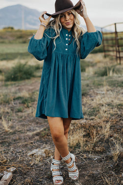 Blue sleeve dress and ribbed velvet bracelet with press pimples and empire waist