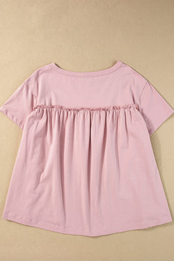 Luz de camiseta de color rosa claro con volantes