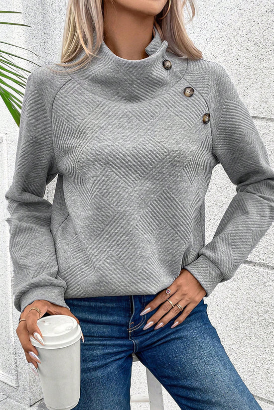 Grey textured sweatshirt with mock neck and asymmetrical buttons