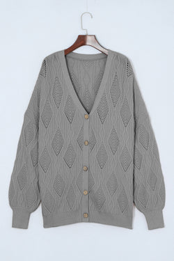 Cardigan Openwork abotonado en un gran tejido gris