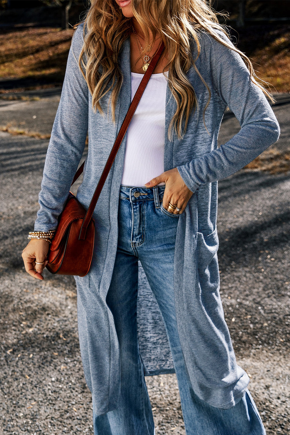 Cardigan long ouvert sur le devant avec poches en tricot flammé bleu