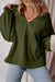 Loose-fitting half-zip hoodie with fleece-lined kangaroo pockets in moss green